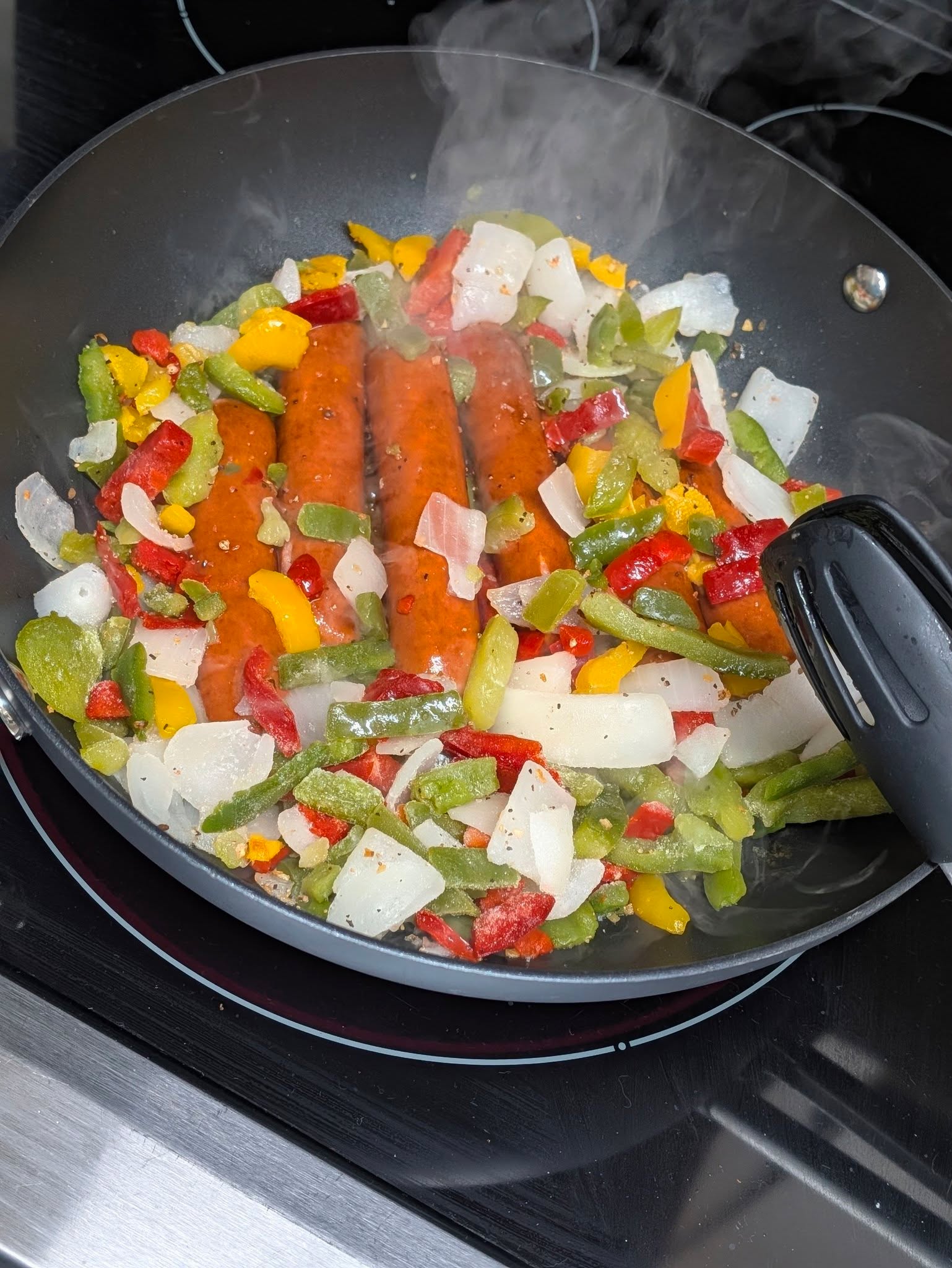 My quick and easy go-to dinner... 🌭🫑🧅 Brats with sautéed peppers and onions! So simple, packed with flavor, and on the table in no time. 🙌

Some nights, easy wins! 😁

✨ What's your favorite quick weeknight dinner? Drop it in the comments—I’m always looking for new ideas!